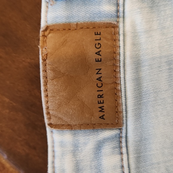 American Eagle Next Level Stretch High-Waisted Distressed Denim Shorts - Picture 3 of 11